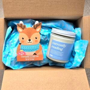 Cocoa and candle in box.